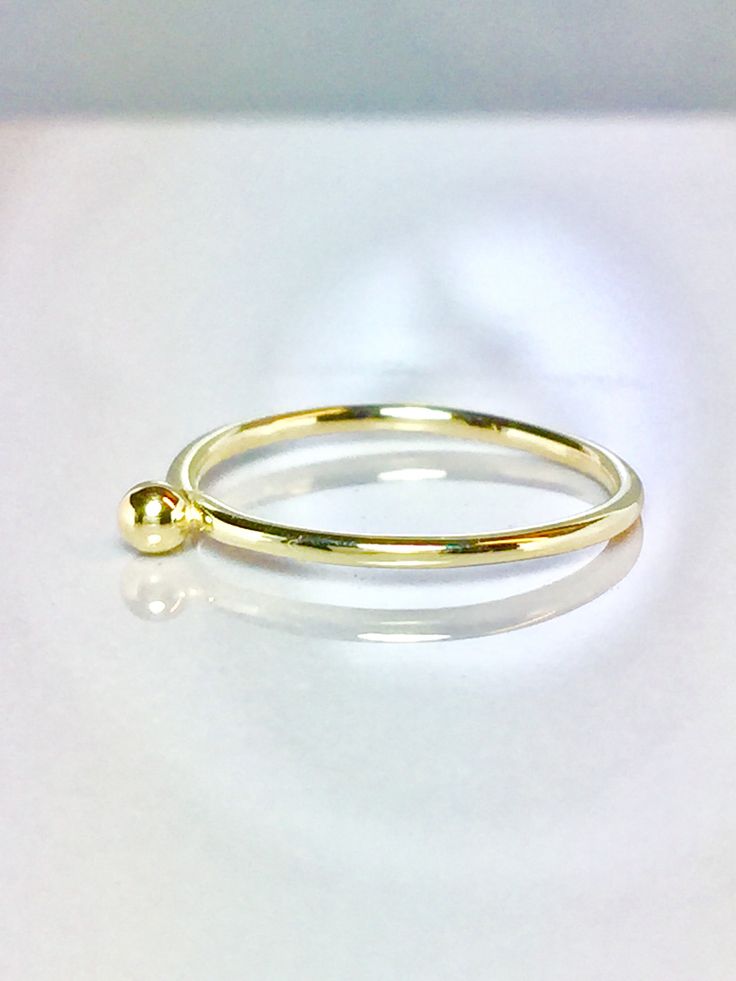 Cute and Dainty solid gold droplet ring Great for baby/children and adults fingers Very sparkly Pave diamond cut or smooth polished finish. **Gold: 14k/10k Real Solid Gold **Thickness approx : 1.0mm **Droplet size: 2.0mm Sturdy and well designed and great for any occasion. **Order yours Today! Gold Stackable Teardrop Jewelry, Yellow Gold Stackable Teardrop Jewelry, Yellow Gold Teardrop Stackable Jewelry, Teardrop Stackable Rings As A Gift, Adjustable Yellow Gold Teardrop Rings, Adjustable Teardrop Yellow Gold Ring, Dainty Teardrop Gold Ring, Minimalist Teardrop Stackable Jewelry, Gold Birthstone Ring With Round Band For Everyday