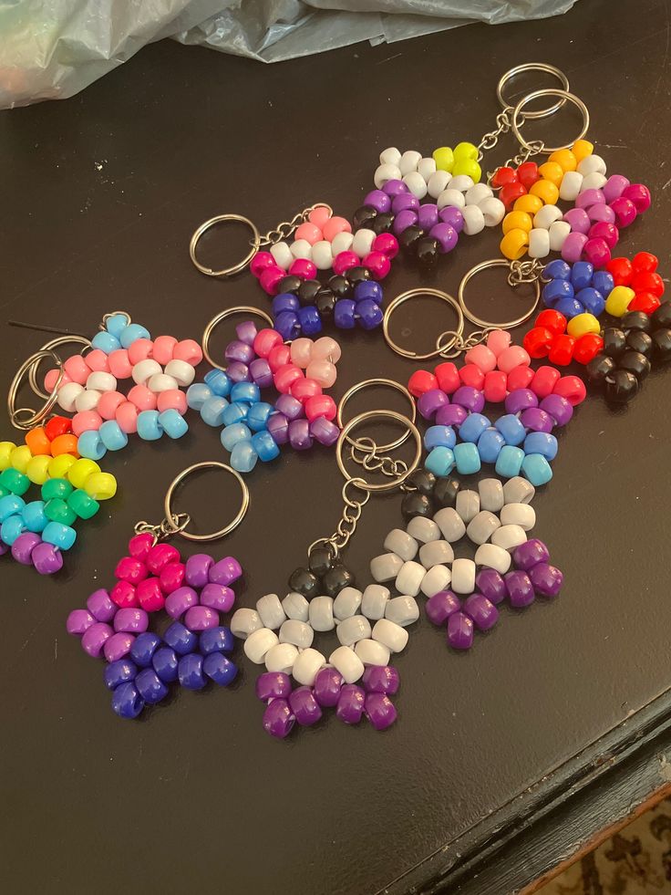 Say what pride flag you want in personalization. Some flags are in limited supply Flags available: Rainbow,gender-fluid,Omni,poly,ace,non binary,lesbian,trans. Pride Kandi Stars, Pride Flag Bracelet Pattern, Agender Bracelet, Diy Pride Flag, Trans Kandi, Sanrio Kandi, Things To Do With Beads, Kandi Core, Kandi Keychain