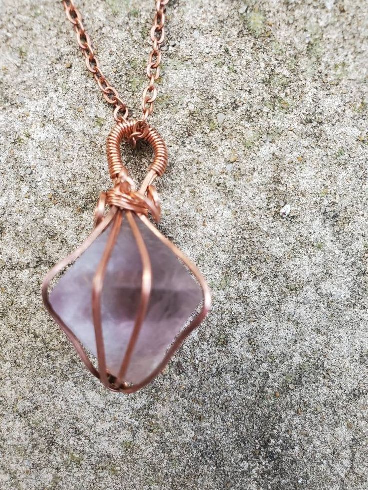 "Pure copper wire wrapped Purple Flourite pendant on 20 inch copper chain. Purple Flourite is the ultimate stone for mentally detoxing. This stone helps to balance the third eye allowing new ideas to flourish in the mind. This stone has been referred to as the \"genius stone\" and helps to enhance mental clarity and focus. This is an excellent stone for someone who is currently studying or just needs an extra mental boost!" Copper Wire Pendant Crystal Necklace For Healing, Copper Wire Wrapped Crystal Necklace For Healing, Healing Copper Wire Wrapped Crystal Necklace, Healing Crystal Necklaces With Gemstone And Copper, Smoky Quartz Necklace, Necklace Purple, The Genius, Copper Chain, Mental Clarity