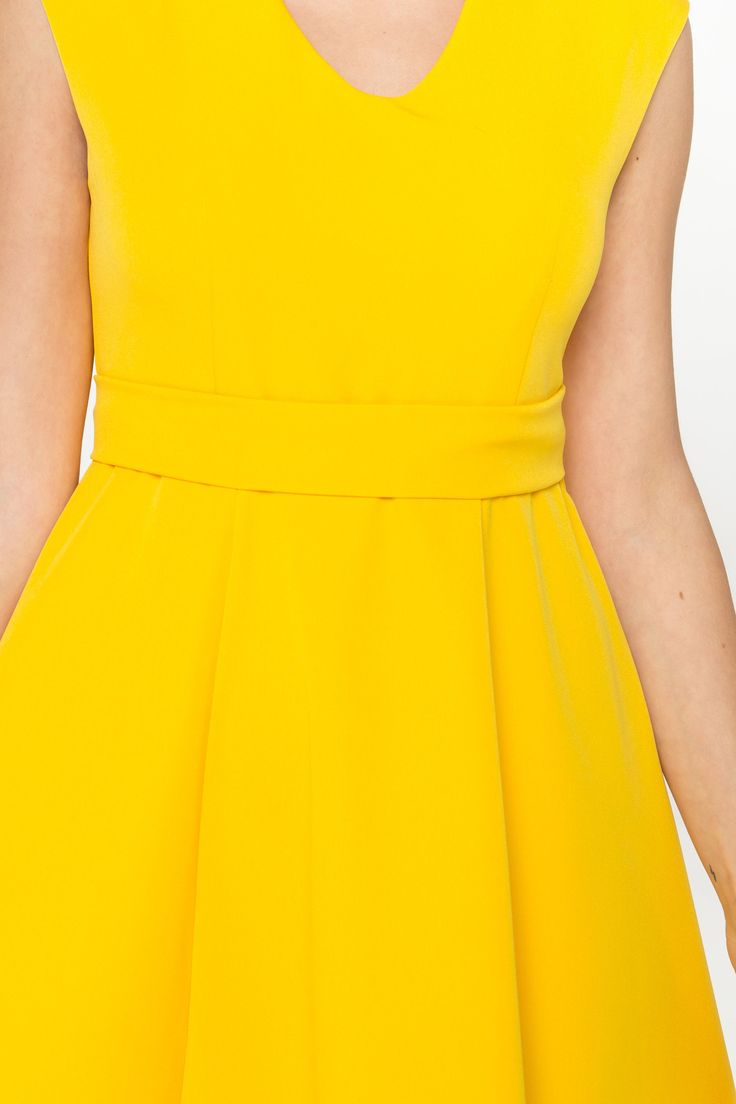 "A cocktail dress featuring a fit and flare silhouette, midi length and cap sleeves. - fit and flare silhouette - round v neck - knee length (midi) - cap sleeves - fabric belt - lined bodice - concealed zipper in side seam - perfect viscose fabric (comfortable and soft to touch) - Color: yellow Fiber: 60% viscose, 35% polyester, 5% elastane, lining - 95 % viscose, 5 % elastane. For size S:dress length- 40,0 \" (102 cm) Our model wears size S (US 6) and is 171cm/5'6\" tall You may feel free choos Fit And Flare V-neck Dress With Pleated Waist, V-neck Fit And Flare Dress With Pleated Waist, Fit And Flare A-line Tea Length Dress For Cocktail, Wedding Fit And Flare Tea Length Dress, Elegant Yellow A-line Sleeveless Dress, Elegant Yellow Sleeveless Mini Dress, Elegant Yellow Mini Sleeveless Dress, A-line Sleeveless Dress For Bridesmaids, Fitted V-neck Sleeveless Dress For Wedding Guest