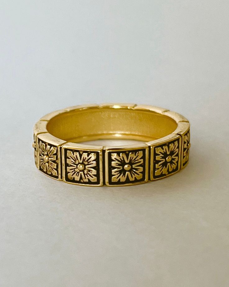 Gold Fleur Band has a vintage style look and stacks well with other rings. This lovely ring is 18kt gold plated silver 5.5mm wide. All items come in a gift box ready to gift. To see more please visit  https://www.etsy.com/shop/BijouLimon Bijou Limon jewelry collections present a romantic French spin on the latest jewelry trends. Based on the US West Coast but French at heart, Bijou Limon interprets the current jewelry trends and delivers timeless pieces that make you swoon. From Necklaces, Earri Adjustable Gold Metal Flower Ring, Vintage Gold Metal Rings, Adjustable Gold Flower Ring In Brass, Adjustable Gold Brass Flower Ring, Vintage Adjustable Tarnish-resistant Jewelry, Vintage Yellow Gold Stackable Jewelry, Bohemian Gold Flower Ring, Handmade Gold Bohemian Flower Ring, Handmade Bohemian Gold Flower Ring