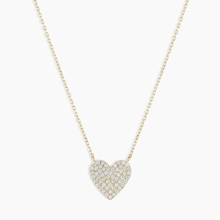 An array of dazzling pavé diamonds illuminates this 14k gold heart necklace. This is the perfect gift for Mom or for a loved one. Product Details 0.358 total carat weight Fifty-four 0.9mm and four 1 mm round GH SI1-SI3 diamonds 14k solid gold 15" chain + 2" extender. Adjustable in 1" increments 15" - 17" Pavé heart measures 10 mm by 10 mm Spring ring closure | Diamond Pavé Heart Necklace in Gold, Women's in 14k gold by Fine Luxury 14k Gold Heart Necklace For Valentine's Day, Heart-shaped Yellow Gold Diamond Necklace, Heart Shaped Yellow Gold Diamond Necklace, Valentine's Day Double Heart Jewelry In Pave Setting, Fine Jewelry 14k Gold Heart Pendant Diamond Necklace, 14k Gold Heart Pendant Diamond Necklace, Valentine's Day Diamond Necklace With Pave Setting, Elegant Heart-shaped Diamond Necklace, 14k Gold Heart Jewelry With Single Cut Diamonds