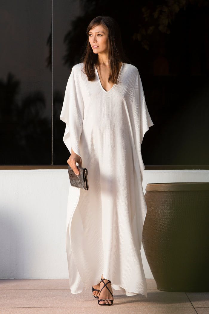 Croco Jacquard Boubou Caftan – Marie France Van Damme Elegant V-neck Kaftan For Vacation, Elegant White V-neck Kaftan, Elegant Oversized Kaftan, Chic Long White Kaftan, Elegant Oversized Spring Kaftan, Elegant White Beach Kaftan, Elegant Oversized Dresses For Vacation, Chic White V-neck Kaftan, Elegant Summer Kaftan For Daywear