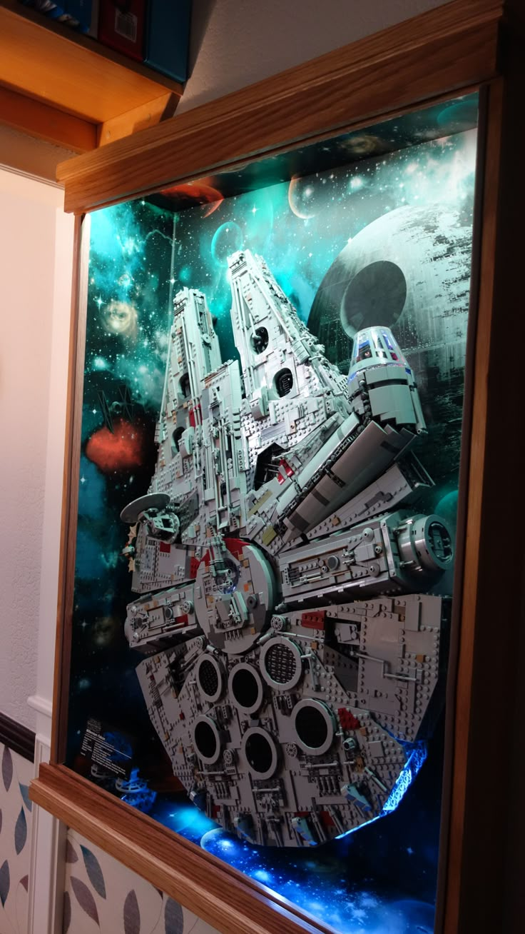 a lego star wars millennium falcon model on display