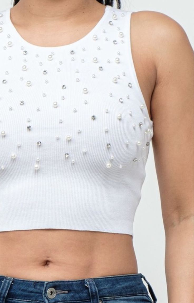 This stylish tank is the perfect addition to your summer wardrobe! This knit crop top features pearl and rhinestone embellishments and stretchy material. The material is 70% Rayon and 30% Nylon. Beaded Tank Top Diy, Diy Pearl Top, Diamond Birthday, Tank Tops Diy, Pearl Tops, Beaded Crop Top, Pearl Top, Denim And Diamonds, Rhinestone Top