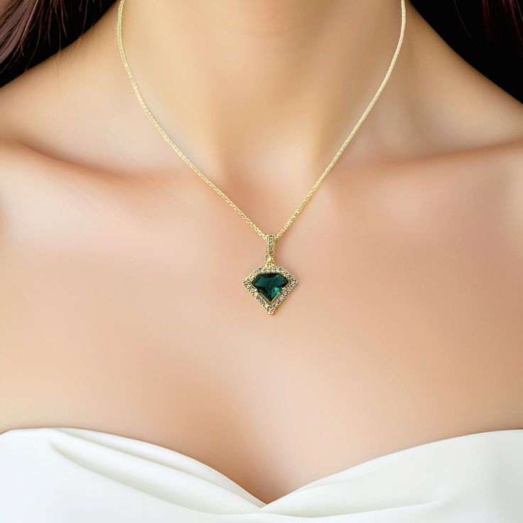 **All orders come with tracked shipping** PLUS **Free shipping on orders over $35 USD for US customers** High quality yellow gold plated Gatsby style earrings and necklace set with beautiful green cubic zirconia stones in a very unique shape. Would make the perfect gift for a superwoman in your life.  The chain is 1mm thick and 46cm long. It is easily adjustable to make it shorter to your desired length simply by pulling on the chain through the round gold bead. It also has 2 removal options - u Fine Jewelry Green Jewelry Sets, Fine Jewelry Green Jewelry Sets As Gift, Fine Jewelry Green Jewelry Sets For Gift, Green Emerald Pendant Necklace For Her, Green Emerald Pendant Necklace As A Gift For Her, Green Emerald Necklace With Jewels As A Gift, Green Fine Jewelry Sets For Gift, Elegant Green Emerald Necklace Gift For Her, Gold Emerald Necklace For Her