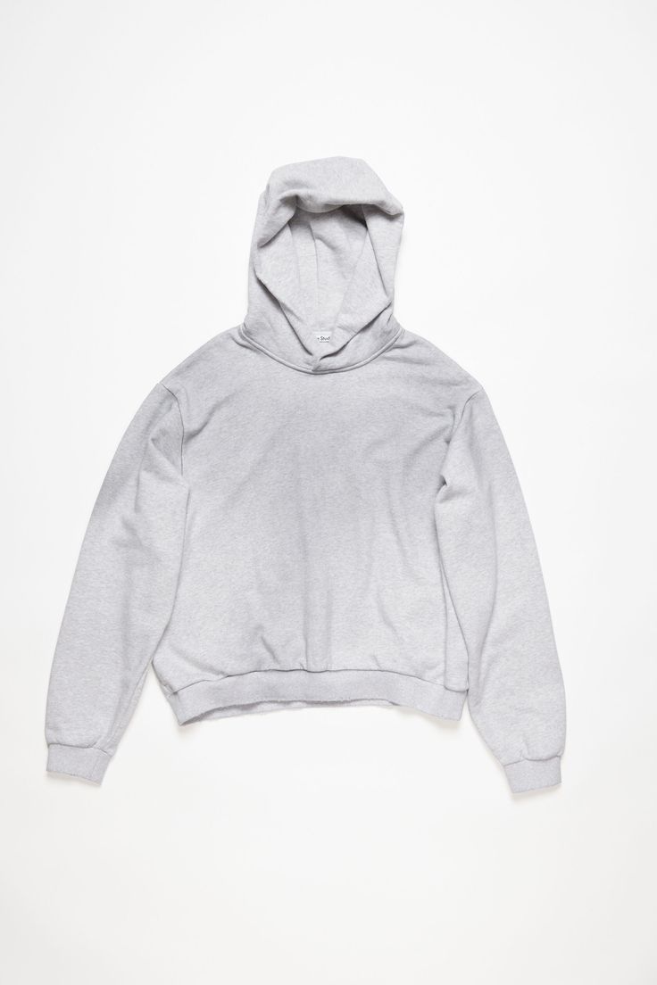 <div>Hooded sweater is cut to a relaxed unisex fit with dropped shoulders and below-hip length. Detailed with an Acne Studios logo stamp print at the back, crafted from a fleece cotton blend with a vintage sprayed effect.</div> Fleece Hoodie With Ribbed Cuffs And Drop Shoulder, Drop Shoulder Fleece Hoodie With Ribbed Cuffs, Urban Hoodie With Ribbed Cuffs And Drop Shoulder, Urban Hoodie With Drop Shoulder For Loungewear, Athleisure Sweatshirt With Drawstring Hood And Drop Shoulder, Sporty Sweatshirt With Drawstring Hood, Urban Drop Shoulder Hoodie For Loungewear, Basic Hoodie Sweater For Streetwear, Oversized French Terry Sweats For Streetwear