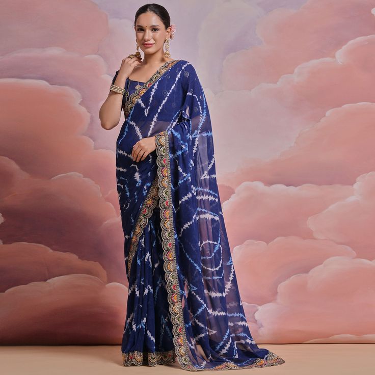 Blue colored saree is made from georgette fabric which is highlighted with beautiful printed work as shown. Comes along with unstitched mono silk blouse piece which you can customise as per your design/style. Occasion - You can wear this saree for party, functions and fashionista. Note:- the actual product may differ slightly in color and design from the one illustrated in the images when compared with computer or mobile screen. Measurements: Saree : Georgette : 5.5 Mtrs Blouse : Georgette : 0.8 Saree For Party, Saree Georgette, Embroidered Border, Baby Skin Care, Mobile Screen, Silk Lehenga, Georgette Saree, Georgette Fabric, Georgette Sarees