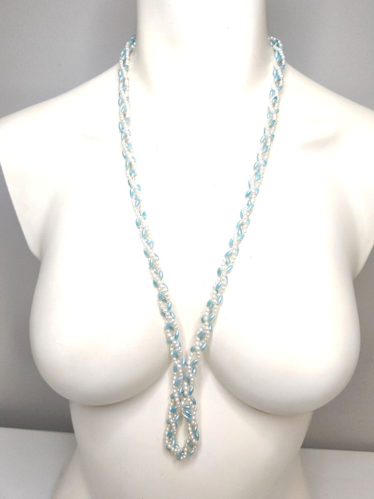 VINTAGE NECKLACE BLUE BEADS WHITE FAUX PEARLS BEADED BRAIDED Elegant Light Blue Beaded Chain Necklaces, Elegant Light Blue Beaded Chain Necklace, Elegant Light Blue Necklace With Beaded Chain, Adjustable Multi-strand Pearl Beaded Necklace, Beaded Lariat Pearl Necklace, Adjustable Blue Pearl Drop Jewelry, Adjustable Beaded Lariat Pearl Necklace, Light Blue Beaded Necklaces For The Beach, Blue Pearl Jewelry For Jewelry Making