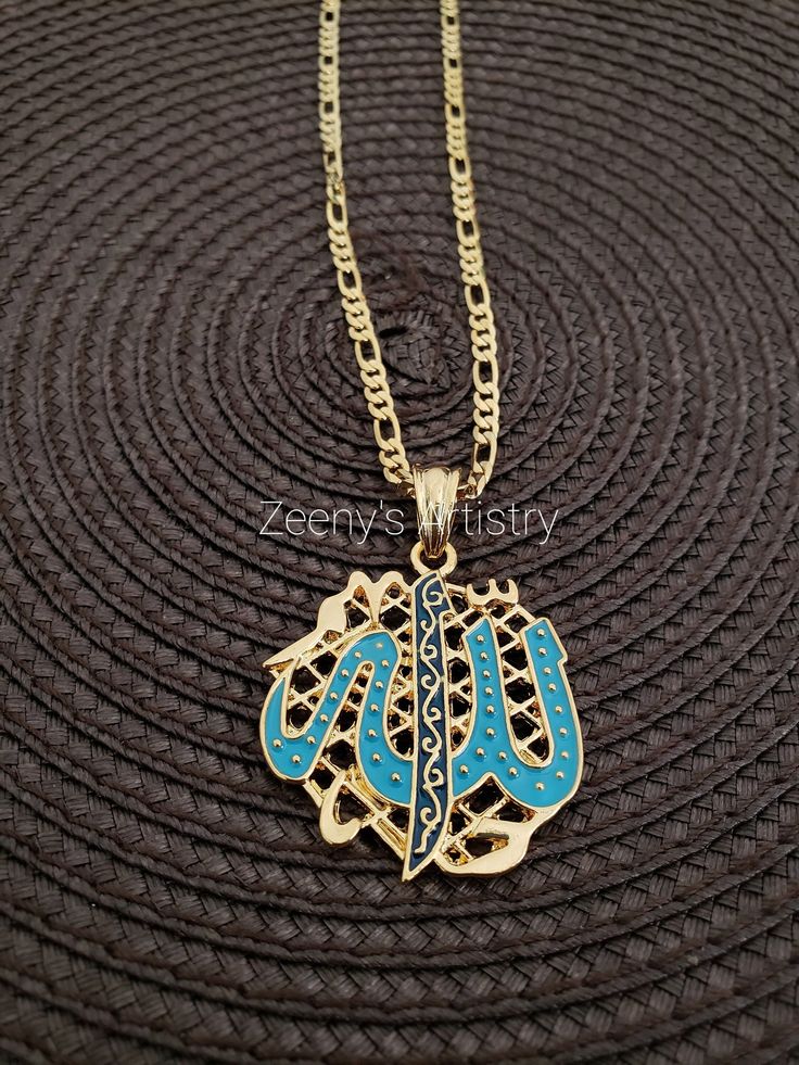 ITEM 1735 18k gold plated large blue Allah pendant with necklace. This stunning piece is a beautiful gift to wear for a special occasion.   Size: 2  X 1.5 inches Necklace Length: 23.5 inches *Color may differ from picture due to lighting.* Blue Round Pendant Chain Jewelry, Blue Round Pendant Jewelry With Chain, Blue Jewelry With Round Pendant Chain, Blue Jewelry With Chain And Round Pendant, Elegant Blue Necklace With Gold Chain, Elegant Blue Jewelry With Gold Chain, Blue Medallion Jewelry With Adjustable Chain, Blue Personalized Round Pendant Jewelry, Blue Personalized Round Pendant Necklace