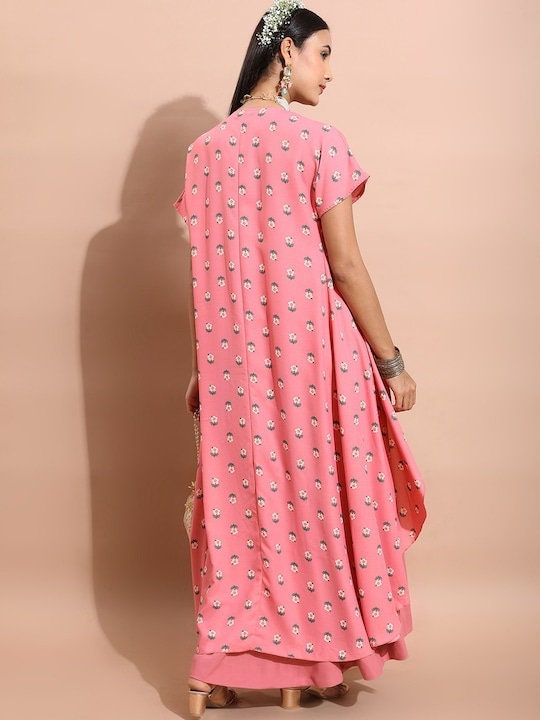 This ethnic co-ord set consists of a top, palazzos, and a jacket Pink & green floral printed cropped-top, has shoulder straps, sleeveless and slip-on closure Pink solid palazzos has a slip-on closure Comes with a matching printed jacket with short regular sleeves Size & Fit Please check the last image above for a complete size chart. Material & Care Top: Polyester Palazzos: Polyester Jacket: Polyester Machine Wash Bohemian Summer Floor-length Palazzo Set, Summer Bohemian Floor-length Palazzo Set, Spring V-neck Palazzo Set, Front Open Palazzo Set For Eid, Traditional Spring Sets With Back Tassel Tie-up, Bohemian Printed Palazzo Set For Navratri, Bohemian Printed Palazzo Set, Bohemian Floral Print Palazzo Set For Spring, Bohemian Floor-length Palazzo Set With Floral Print