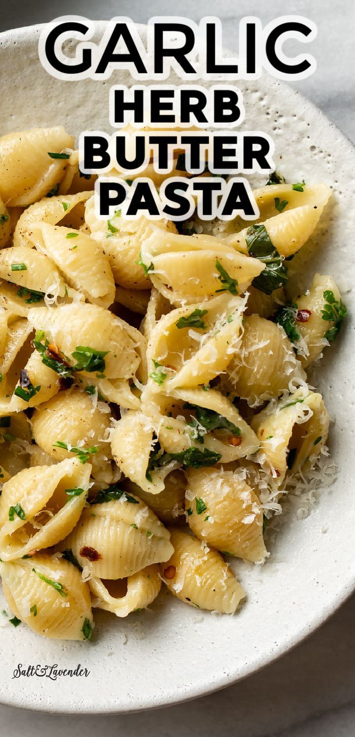 garlic herb butter pasta in a white bowl