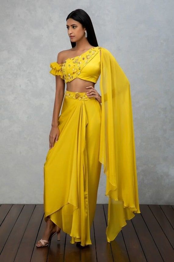 Glamorous Dhoti Saree With Embellished Belt, IndoWestern Dress, Indian Wedding Mehendi Sangeet party wear Dress,Indian Fusion Wear Crop top Fancy crop top yellow dhoti  mehendi wear  Function wear  all size available allcolors possible Isha Gupta, Wedding Mehendi, Dhoti Saree, Haldi Outfits, Western Dresses For Women, Haldi Outfit, Mehendi Outfits, Draping Fashion, Indo Western Dress