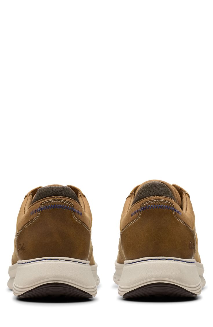 A padded collar adds comfort to this sporty leather sneaker resting on a cushy contoured footbed and lightweight traction sole. Leather upper and lining/synthetic sole Imported Moc Toe Sneakers With Cushioned Footbed For Outdoor Activities, Casual Slip-resistant Walking Shoes, Brown Leather Walking Shoes With Cushioned Footbed, Casual Moc Toe Walking Shoes For Outdoor, Cushioned Round Toe Synthetic Sneakers, Slip-resistant Sneakers For Sports, Rugged Cushioned Slip-on Walking Shoes, Leather Sneakers With White Sole And Arch Support, Casual Moc Toe Walking Shoes For Outdoor Activities