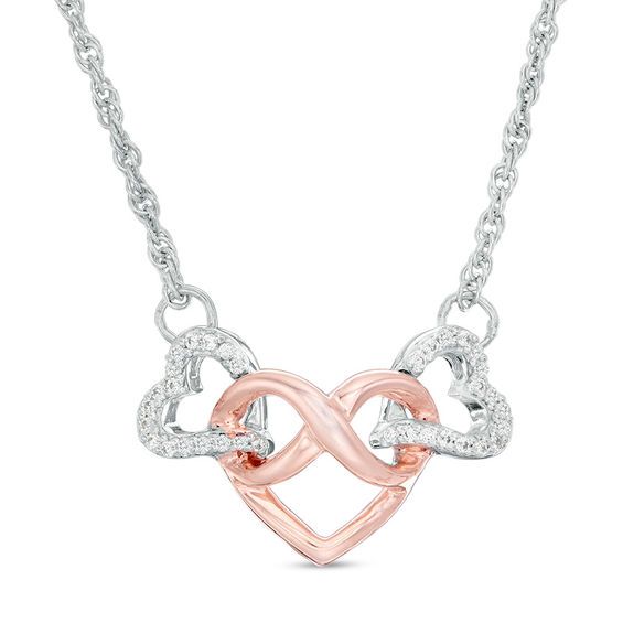 A fun and flirty look, this triple-heart diamond necklace is also a loving gift. Crafted in sterling silver and precious 10K rose gold, this sparkling style features a polished rose gold infinity symbol-topped heart flanked by linked diamond-lined silver heart outlines. Radiant with 1/10 ct. t.w. of diamonds and a brilliant buffed luster, this trio design suspends centered along a 17.38-inch rope chain that secures with a spring-ring clasp. Triple Heart, Heart Necklace Diamond, Infinity Heart, Peoples Jewellers, Heart Diamond, Infinity Symbol, Diamond Heart, Rope Chain, Diamond Stone