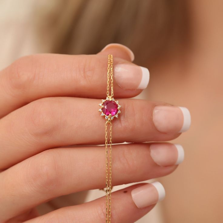 Discover the timeless elegance of our Real Diamond Ruby Bracelet, expertly crafted in 14K Solid Gold. A perfect July birthstone gift symbolizing love and passion. Ideal for Mother's Day, your girlfriend, or wife. Its dainty design adds a touch of sophistication to any outfit. A genuine token of affection. Ruby, also known as the luck stone from past to present, gives happiness and confidence to the person.Along with luck, it means wealth and success. strengthens creative ability and stimulates i Elegant 14k Gold Bracelet With Birthstone, Elegant Birthstone Tennis Bracelet As Gift, White Gold Gemstone Bracelets In 14k Gold, Gold Bracelet With Prong Setting For Gift, 14k Gold Bracelets For Gift, 14k Gold Bracelets For Gifts, 14k Gold Round Cut Bracelets For Gift, Elegant Gold Birthstone Bracelet, 14k Gold Gemstone Tennis Bracelet