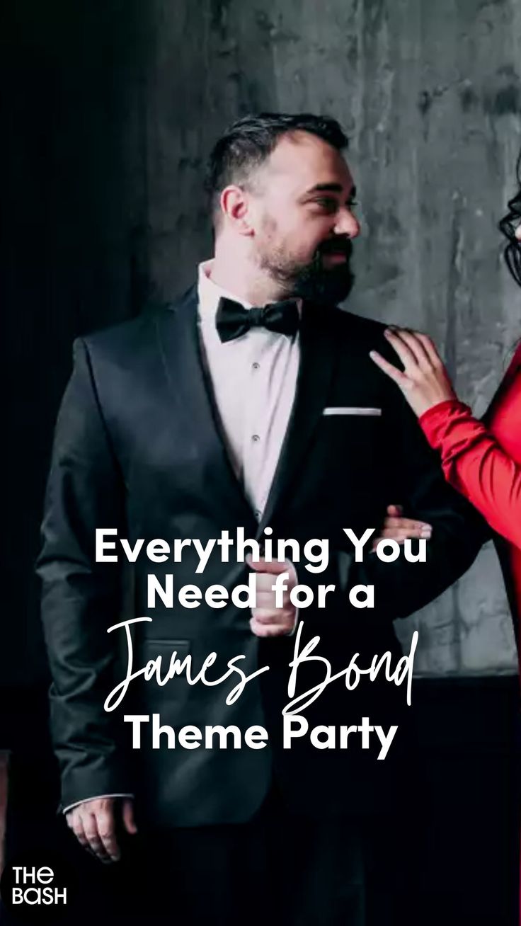 a man in a tuxedo standing next to a woman wearing a red dress