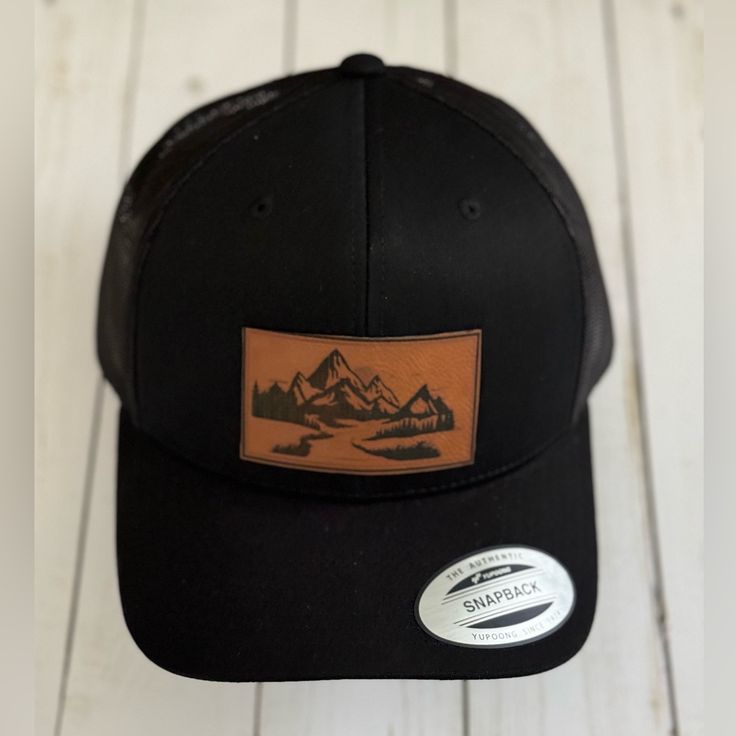 Enjoy This New Trucker Hat, With A Leather Patch Of The Cascade Mountains. Black Adjustable Snapback Hat For Everyday, Outdoor Black Hat With Flat Bill, Black Snapback Hat For Fall, Casual Black Baseball Cap For Camping, Black Outdoor Hat For Fall, Black Fall Outdoor Hat, Black Baseball Cap For Outdoor Fall Activities, Black Flat Bill Hat For Everyday, Everyday Black Hat With Curved Brim