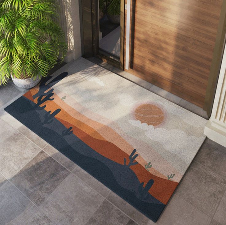 a door mat with an orange and blue design on it