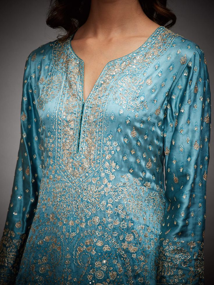 Editor's Note Enhance your ethnic elegance with our round neck full sleeves kurta, paired with garara pants and a matching dupatta. This ensemble combines traditional grace with a touch of modern style. The kurta features a classic round neckline and full sleeves, while the garara pants offer a unique and trendy silhouette. The coordinating dupatta completes the look with finesse. Whether you're attending a wedding, festival, or any special occasion, this outfit will make you stand out with its Chanderi Palazzo Set With Resham Embroidery And Long Sleeves, Anarkali Palazzo Set With Zari Work And Long Sleeves, Anarkali Style Long Sleeve Palazzo Set With Dabka, Silk Salwar Kameez With Gota Work And Long Sleeves, Anarkali Palazzo Set With Dabka Work And Long Sleeves, Chanderi Long Sleeve Sharara For Festive Occasions, Long Sleeve Chanderi Sharara For Festive Occasions, Chikankari Embroidered Chanderi Palazzo Set With Long Sleeves, Anarkali Kurta With Gota Work And Long Sleeves