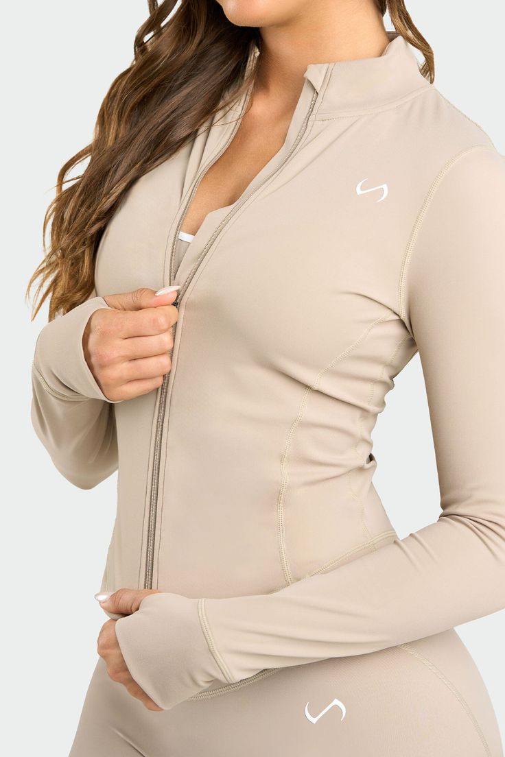 Model Specs: Kamila Is 5'10”, 138lbs Bust 34B And Wearing A Small (Tempo Cropped Zip Up Jacket) Luxe DNA™ Fabric: Virtually Weightless + Buttery Soft + Breathable + Sweat-Wicking Infi-Soft DNA™, Infi-Stretch DNA™ Technologies Sleeve Thumbholes Internal Sleek Hidden Pockets To Store Your Necessities TLF High-Tech Gel Logo On Left Chest And Rear Neck Cropped Length Designed For: Low Impact (Workouts, Light Cardio, All-Day Wear) Fit: Fitted Fabric: Luxe DNA™ (75% Polyamide / 25% Elastane) Colors: B Cropped Zip Up Jacket, Light Cardio, Cropped Zip Up, Low Impact Workout, Women Hoodies Sweatshirts, Boyfriend Fit, Zip Up Jacket, High Tech, Zip Up