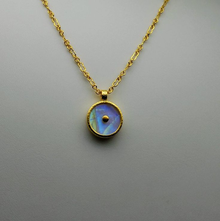 MOONSTONE GOLD SUN SYMBOL NECKLACE Gold Moonstone Necklace With Moon Charm, Celestial 14k Gold Round Pendant Jewelry, Minimalist Moon Phase Jewelry For Healing, Celestial Gold Gemstone Jewelry, Gold Moonstone Round Jewelry, Round Gold Moonstone Necklaces, Gold Moonstone Round Necklaces, 14k Gold Spiritual Coin Necklace With Round Pendant, Gemstone Round Pendant Amulet Necklace