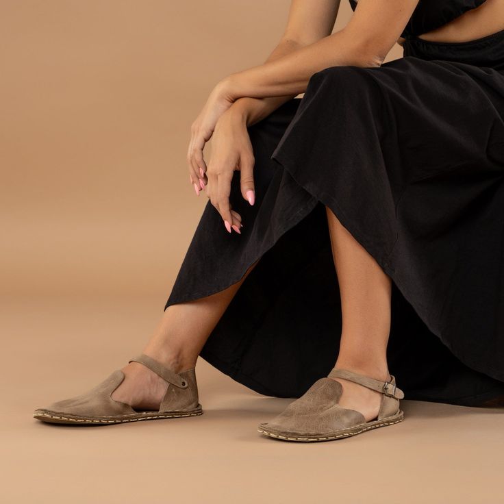 Step out in style and comfort with our Tan Closed Toe Barefoot Sandals! Handmade with 100% natural leather, these sandals feature a natural leather upper and lining, and a water buffalo leather sole that's perfect for all-day wear. The "zero-drop" non-elevated heel ensures proper posture while the wide toe boxes give your toes enough room to spread and relax. To ensure the perfect fit, use our easy-to-follow size chart and measure your foot to find the right size. With next day shipping and free T-strap Sandals With Leather Sole And Round Toe, Leather Sole T-strap Sandals With Round Toe, Suede Open Toe Espadrilles With Cushioned Footbed, Suede Espadrilles With Stitched Sole For Beach, Ankle Strap Espadrilles With Buckle Closure, Suede Espadrilles For Vacation, Closed Toe Sandals With Leather Sole, Beige Open Toe Sandals With Stitched Sole, Beige Sandals With Stitched Sole