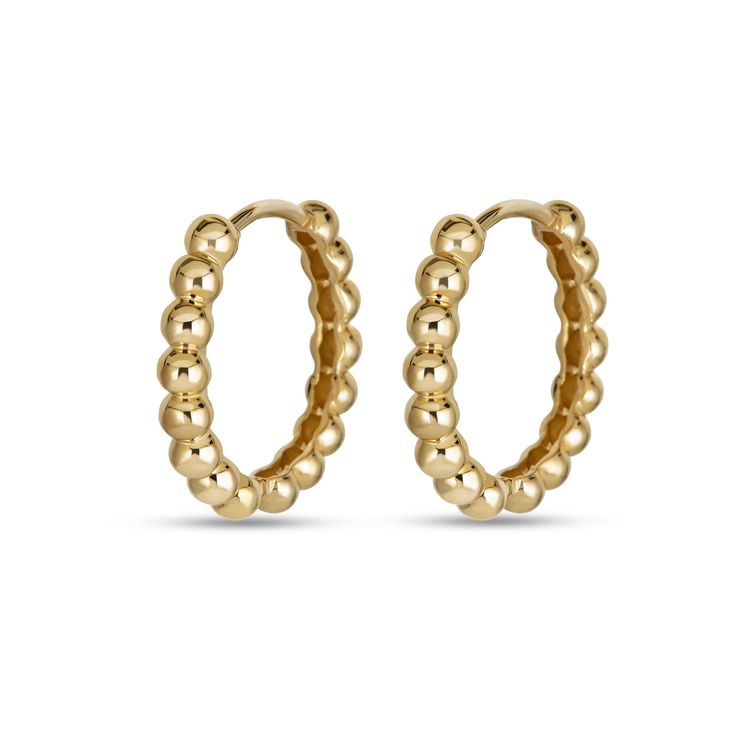 We’re forever fans of solid gold — it’s the perfect material for crafting our collection of timeless, everyday jewelry . We focus on creating a range of staples made from materials of the very highest quality - namely 100% solid gold that won't tarnish or flake. And, because it’s our goal to always be fair with our pricing, we offer the best value for these never-take-off styles. 10K Solid yellow gold Interior diameter: 15mm Huggie width: 3.3mm Sold as a pair Stackable Yellow Gold Hoop Earrings Fine Jewelry, Classic Small Hoop Jewelry In Recycled Gold, Elegant Stackable Hoop Earrings For Everyday, Gold Stackable Earrings For Anniversary, Classic Yellow Gold Jewelry With Gold Beads, Gold Stackable Earrings 14k Gold Filled, Gold Stackable 14k Gold Filled Earrings, Elegant Stackable Small Hoop Jewelry, Yellow Gold Huggie Stackable Jewelry