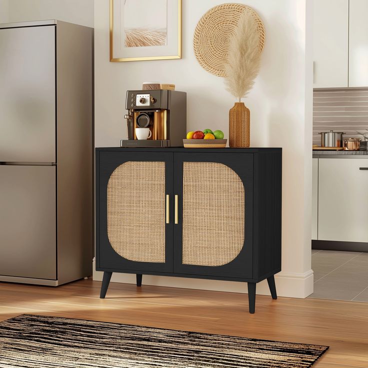 a black cabinet with wicker doors in a kitchen next to a refrigerator and rug