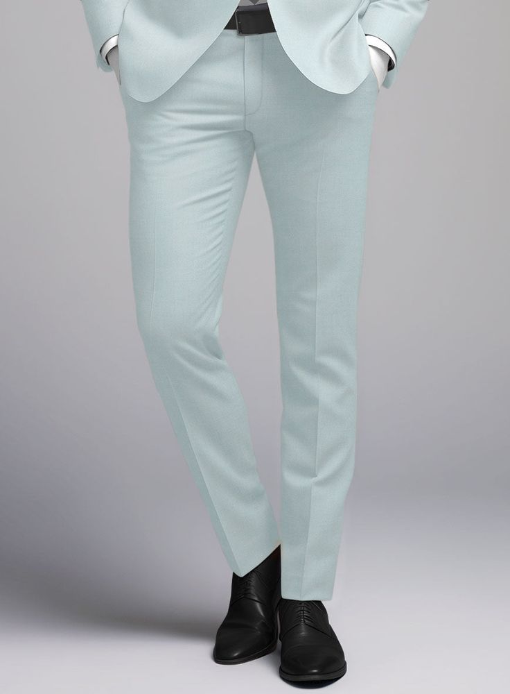 Infuse your style with confidence and poise in our Napoleon Pale Blue Wool Pants. Crafted with precision from a premium wool blend, these pants dazzles in a pale blue shade, showcasing a sleek solid pattern that defines luxury and comfort in every stitch. Perfectly suited for a range of events from joyous wedding celebrations to critical business meetings - this piece is designed to ensure you leave a lasting impact on any occasion.   Look Includes   Napolean Pale Blue Wool Fabric  Cross Pocket Elegant Blue Pants With Straight Hem, Elegant Light Blue Trousers, Fitted Classic Light Blue Bottoms, Light Blue Fitted Full-length Bottoms, Light Blue Fitted Full Length Bottoms, Fitted Light Blue Straight Pants, Fitted Light Blue Trousers, Formal Light Blue Bottoms For Spring, Light Blue Formal Spring Bottoms