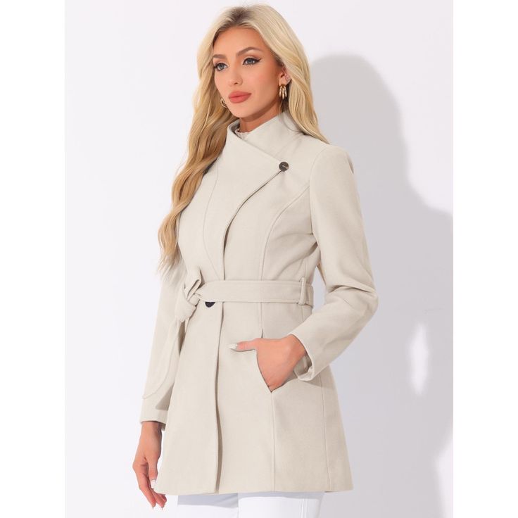 This coat turns casual outerwear into a fashion-forward statement. Step out in style on even the dreariest days with the one-button belted long coat. Those neutral colors on this belted coat with wide lapels maintain a grounded, mature style that will never go out of fashion. Paired well with a crossbody for a day out. Team it with pumps and a bold red lip for an evening look. Fall Outerwear With Double Button And Stand Collar, Belted Beige Outerwear For Office, Chic Solid Collared Outerwear, Chic Solid Color Collared Outerwear, Fitted Outerwear With Stand Collar In Solid Color, Trendy Collared Solid Color Outerwear, Chic Button-up Solid Color Outerwear, Fall Office Outerwear With Stand Collar, Office Outerwear With Stand Collar For Fall