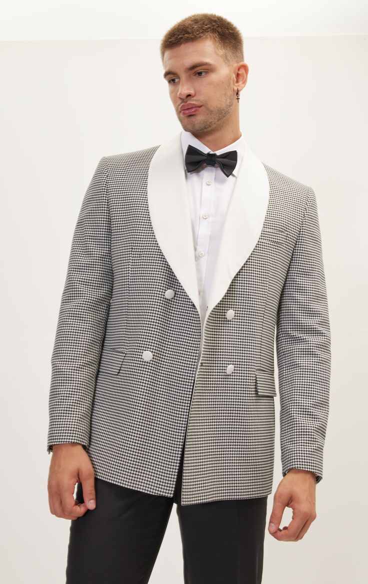 DETAILS Elevate your formalwear game with the Ron Tomson Classic Double Breasted Dinner Jacket, now featuring a sophisticated houndstooth pattern, off-white lapels, and a luxurious off-white satin-covered 6x2 button setup. This jacket is a harmonious blend of classic aesthetics and contemporary flair, ensuring you make a lasting impression at any upscale event.The distinguished houndstooth pattern adds a touch of timeless elegance to this already iconic piece. Meticulously woven into the fabric, Elegant White Tweed Jacket For Business, Formal Long Sleeve Tweed Jacket With Houndstooth Pattern, Formal White Single Breasted Tweed Jacket, White Single-breasted Tweed Jacket For Formal Occasions, Formal White Single-breasted Tweed Jacket, Elegant White Tweed Jacket For Formal Occasions, Elegant White Tweed Jacket For Formal Events, Elegant Tweed Jacket With Houndstooth Pattern, Elegant Houndstooth Tweed Jacket For Tailoring