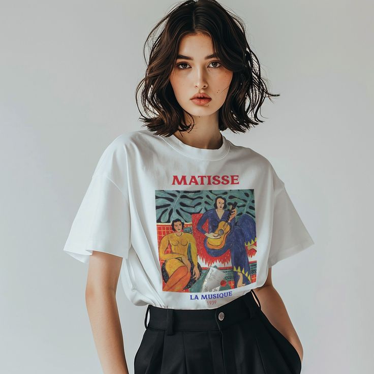 Matisse art shirt, trendy graphic tee. ♥️ Soft, comfy ♥️ Regular fit, unisex ♥️ 100% ring-spun cotton ♥️ Medium fabric == SIZE == Please check the size guide in the images section to avoid disappointment. Compare your fav shirt to the size chart I've added and choose accordingly. Runs true to size. For a relaxed/loose fit size up 1 size from your regular size. For an oversized fit or for a t-shirt dress look, we suggest sizing up two sizes. == SHIPPING & DELIVERY == I have print partners in the Artsy Cotton T-shirt With Graphic Print, Artsy Cotton Crew Neck T-shirt, Artsy Crew Neck T-shirt With Graphic Design, Artsy White Short Sleeve T-shirt, Artistic Short Sleeve T-shirt With Letter Print, Artistic Graphic Print T-shirt For Streetwear, Artistic Streetwear Summer Tops, Artistic Graphic T-shirt For Streetwear, Artsy Short Sleeve T-shirt With Graphic Print