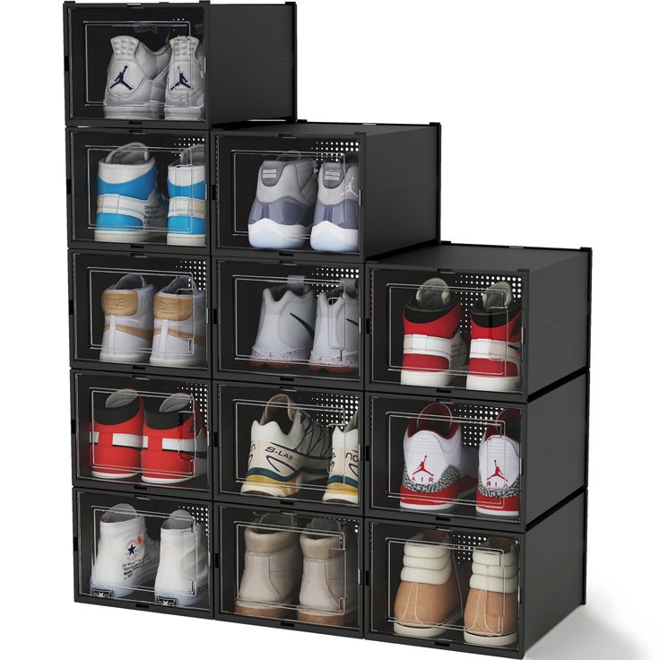 several pairs of shoes are stacked on top of each other in the same bins