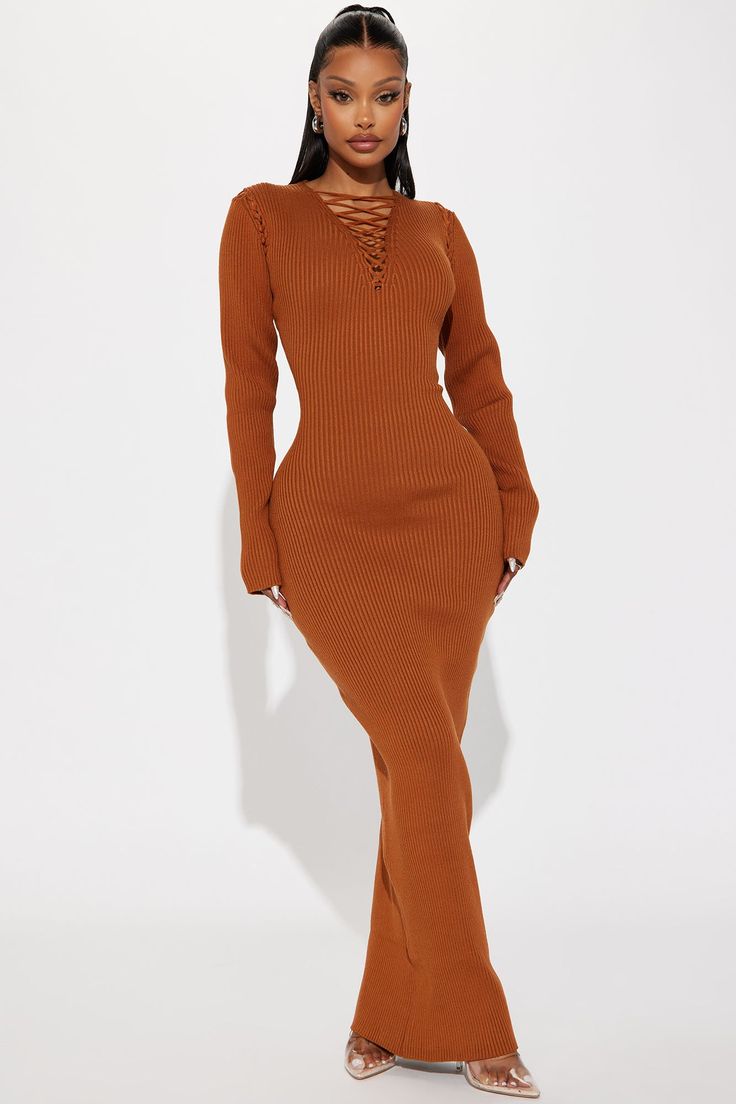 Available In Black, Cognac, And Magenta. Sweater Maxi Dress Long Sleeve V-Neck Lace Up Detail Stretch 50% Viscose 30% Polyester 20% Nylon Imported | Sara Sweater Maxi Dress in Cognac Brown size XL by Fashion Nova Brown Ribbed V-neck Dress, Brown V-neck Ribbed Dress, Brown Bodycon V-neck Dress, Brown V-neck Bodycon Dress, Magenta Sweater, Maxi Dress Long Sleeve, Sweater Maxi Dress, Maxi Dress Long, Dress Long Sleeve