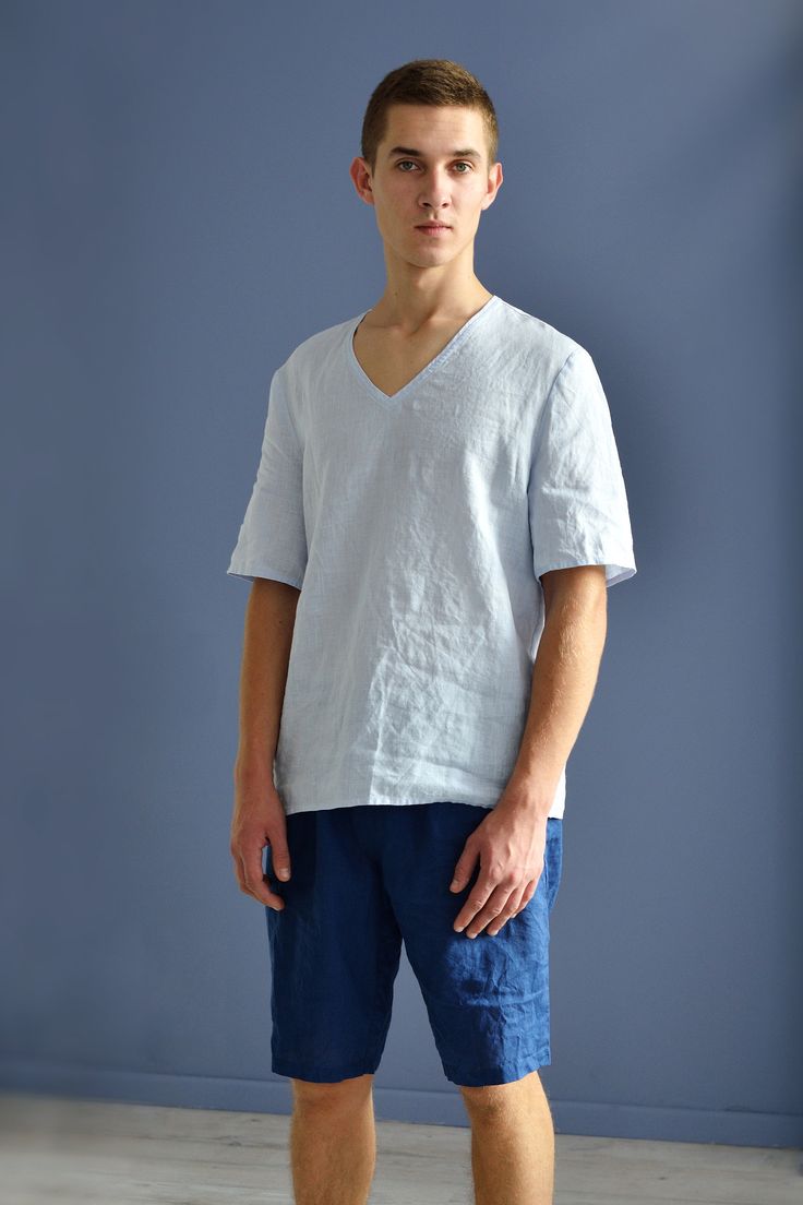 "Linen simple pajama set for summer in organic certified by OEKO-TEX standard 100 linen. Top short sleeved, v-neck, straight form. Top center back length - 27.5\" (70 cm). Shorts with elasticated waist and loose style. Shorts inside seam length - 11\" (28 cm). Pajama linen quality - washed and softened and should not shrink any more. On picture S size model wears article in dark navy/milky white/natural undyed linen size S. Other colors of item please find here: www.etsy.com/listing/538806706/li Affordable Casual Men's Sleepwear, Light Blue Cotton Relaxed Fit Sleepwear, Light Blue Cotton Sleepwear With Relaxed Fit, Light Blue Relaxed Fit Casual Sleepwear, Casual Light Blue Relaxed Fit Sleepwear, Light Blue Short Sleeve Summer Sleepwear, Light Blue Relaxed Fit Sleepwear For Summer, Relaxed Fit Summer Sleep Tops, Relaxed Fit Sleep Tops For Summer