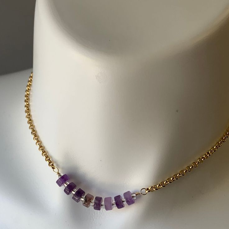 "Amethyst bar chain necklace/ Amethyst bar choker/ aesthetic necklace/ minimalist choker/ minimalist jewelry/ handmade jewelry This beautiful Amethyst necklace is made with  rondelles that are hand wired wrapped to a Rolo gold plated chain creating this one of a kind short necklace.  This necklace is 14.5 \"  This necklace is also part of a triple set, could be also found in our Etsy shop.  A great chain to layer with other chains or necklaces.  This is a great gift for yourself or a loved one Dainty Metal Necklace For Her, Dainty Metal Necklace As Gift For Her, Metal Clavicle Chain Jewelry As Gift For Her, Metal Clavicle Chain Jewelry Gift For Her, Trendy 14k Gold-filled Dangle Jewelry, Minimalist 14k Gold-filled Dangle Jewelry, Metal Necklace With Adjustable Chain As Gift For Her, Trendy 14k Gold Filled Jewelry With Delicate Chain, Metal Clavicle Chain Necklace For Her