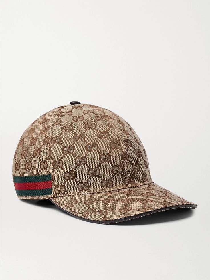 Gucci likes to reinvent itself every so often – think of the label's bold new logos and mascots from the animal kingdom, the interlocking 'GG' motif will always be the house trademark. This monogrammed canvas baseball cap has been made in Italy with signature striped webbing trims and a Velcro®-fastening leather back tab to adjust the fit. Gucci Luxury Hat With Curved Visor, Gucci Luxury Curved Visor Hat, Designer Gucci Baseball Cap With Embroidered Logo, Luxury Embroidered Snapback Baseball Cap, Luxury Embroidered Logo Snapback Baseball Cap, Luxury Flat Brim Baseball Cap With Embroidered Logo, Luxury Snapback Baseball Cap With Embroidered Logo, Designer Baseball Cap With Embroidered Logo, Luxury Baseball Cap With Embroidered Logo And Visor