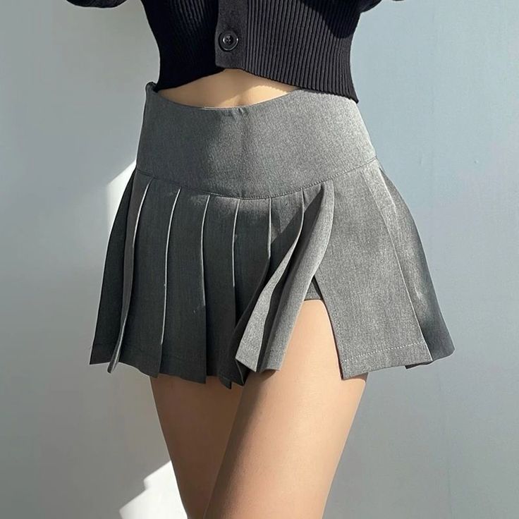 Elegant Miniskirt with Ruffled Hemline and Long-Legging Impact Short Length Pleated Skirt, Non-stretch Pleated Skort, Trendy Non-stretch Skirted Skort, Non-stretch High Waist Pleated Skort, Non-stretch Lined Mini Skirt, Trendy Non-stretch Skort, Gray Pleated Mini Skirt For Spring, Non-stretch Short-length Tennis Skirt For Spring, Pleated Gray Skort For Summer