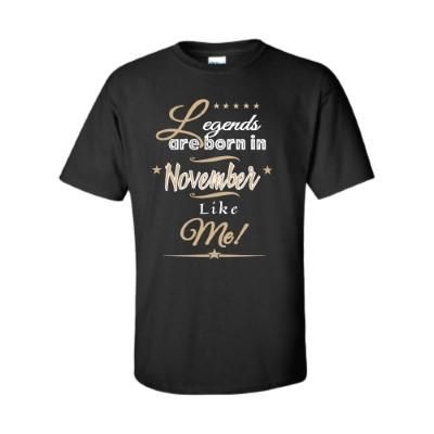 a black t - shirt with gold lettering that says i am so proud and born in november