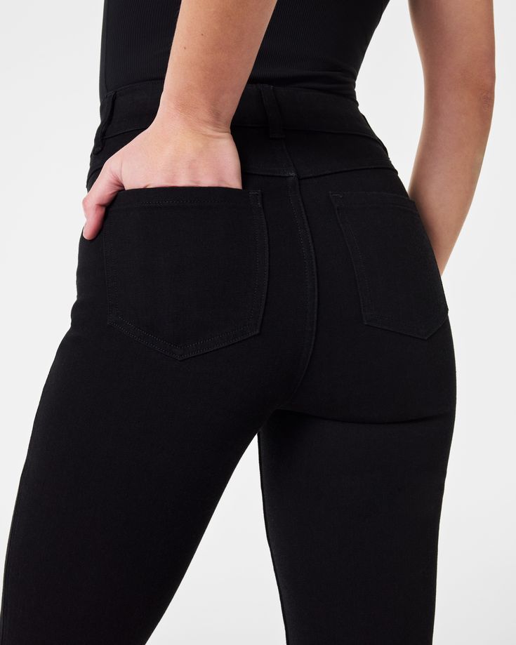 Crafted from premium, 4-way stretch denim designed to hug your curves, our jeans are engineered with built-in targeted SPANX TummyTamer Tech™ that shapes your waist. Plus, a kick flare style elongates the leg and celebrates your figure. All you have to do is pull these on: no zippers, no buttons, no hip pockets (so no bulk!). This is denim done right. | Spanx Women's SPANXshape EveryWear Kick Flare Jeans, Clean Black Classic High Rise Fitted Jeggings, Classic Fitted High Rise Jeggings, Classic Fitted High-rise Jeggings, High Stretch Elastane Jeans, Black Fitted Elastane Jeggings, Fitted Black Elastane Jeggings, Fitted Straight Leg Elastane Jeggings, Trendy Fitted Elastane Jeggings, Fitted High Rise Elastane Jeans