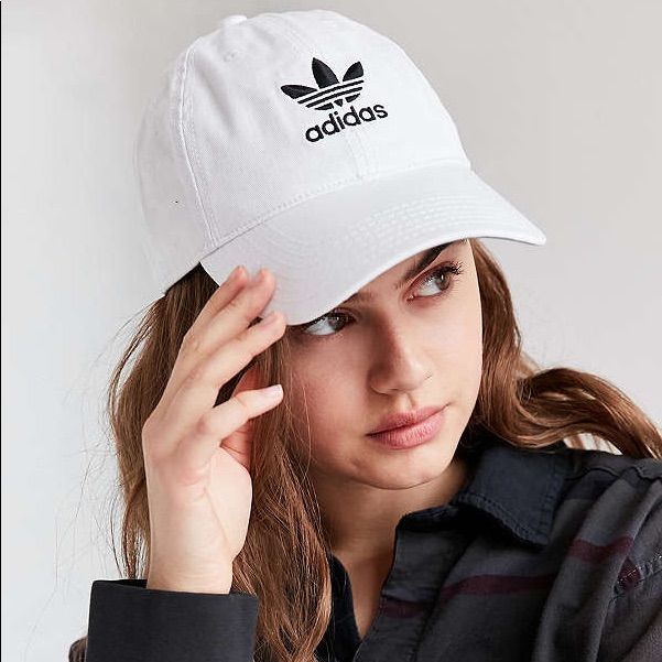 Color: White / Black Top Off Your Look With A Street-Style-Approved Cap Provided By Adidas. The Washed Strapback Dad Hat Has A Naturally Curved Bill, Breathable Embroidered Eyelets, And Adidas Trefoil Embroideries On The Front And Back. -Washed, Solid Color Dad Hat -Embroidered Adidas Logos On Front And Back -Embroidered Eyelets -Naturally Curved Bill -Adjustable Strapback Panel -One Size Fits Most -100% Cotton. New With Tag ! Thanks For Shopping @Toowendy ! Sporty Dad Hat With Curved Visor, Adidas Cotton Hat With Curved Brim, Adidas Cotton Hats With Curved Brim, Adidas Sporty Hats For Spring, Casual Adidas Curved Bill Hats, Adidas Cotton Hats For Summer, Adidas Cotton Baseball Cap For Spring, Adidas Visor Hat For Spring, Adidas Cotton Summer Hats