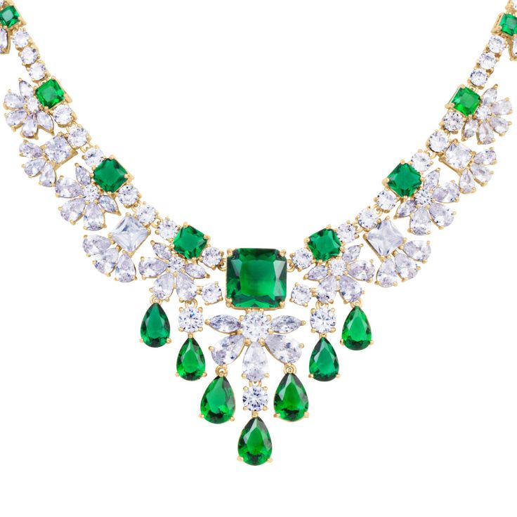 This charming collection is perfect for a special occasion. A cascade of ice white and vivid green gems shimmer across your neckline and sparkle from your earlobe. Just over 80 carats of these delightful signature Diamondeau®, the supreme diamond alternative, in classic cushion, pear and round cuts are handset into this piece. The luxurious 18ct yellow finish completes the look of this superb collection Layered Diamond Necklace, Emerald Cut Engagement Rings Vintage, Classic Cushions, Bridal Diamond Necklace, Dainty Diamond Necklace, Solitaire Necklace, Diamond Alternatives, Diamond Solitaire Necklace, Necklace Bridal