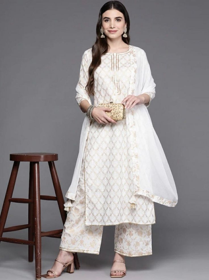 HAND CRAFTED KURTA SET DESCRIPTION *Women Off White Ethnic Motifs Printed Gotta Patti Kurta with Palazzos & With Dupatta Indian Wedding Wear Salwar Kameez / Indian Ethnic Dress / Cotton Kurta Set / Plus Size Silk Kurta Dress Traditional Indian Wear / Salwar Kameez Dupatta / Kurti Palazzo Set *Off white printed Kurta with Palazzos with dupatta *Kurta design:- * Ethnic motifs printed * Straight shape * Regular style * Round neck, three-quarter regular sleeves * Gotta patti detail * Calf length len Off White Dress With Pallu For Diwali, Transitional White Dress With Zari Work, White Dress With Pallu For Transitional Season, White Dress With Pallu For Eid, Transitional White Dress With Pallu Detail, Elegant Off White Palazzo Set For Festivals, White Dress With Zari Work For Navratri, Elegant Off-white Palazzo Set For Festivals, Navratri White Dress With Zari Work