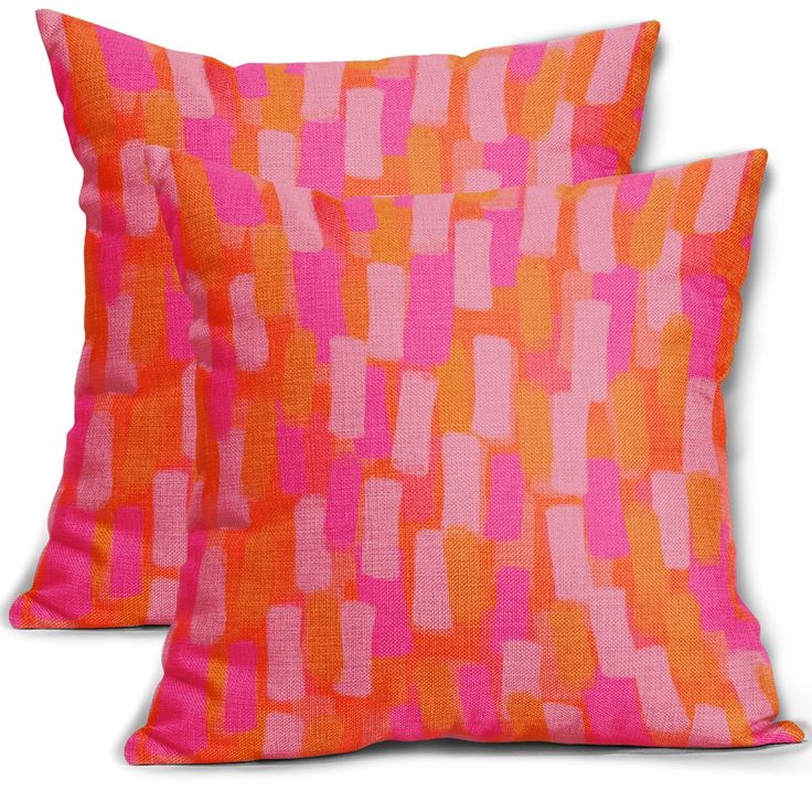 two pink and orange pillows with squares on the front, one is square in color