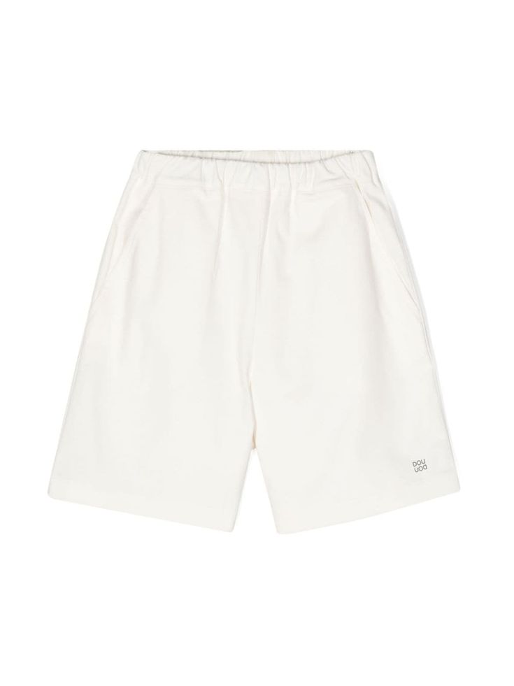 ivory white cotton blend stretch-design twill weave elasticated waistband two diagonal pockets to the sides pull-on style