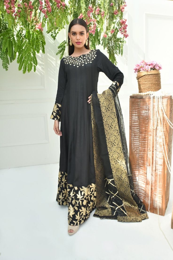 SKU: 1004 Price for Shirt, and trouser. Silk floor length maxi can be worn for any occassion. The handwork of sequences and mirror work makes this outfit stand out for both traditional and modern look. Dupatta can be added with gotta and borders of jamavar. Shirt length 55. Model is wearing XS. Anarkali Style Long Sleeve Palazzo Set With Dabka, Unstitched Maxi Length Traditional Wear With Gota Work, Anarkali Palazzo Set With Dabka Work And Long Sleeves, Elegant Maxi Length Dupatta With Gota Work, Unstitched Gota Work Anarkali Set, Maxi Length Salwar Kameez With Gota Work In Chanderi, Diwali Maxi Length Kurta With Gota Work, Maxi Length Chanderi Salwar Kameez With Gota Work, Designer Cotton Silk Maxi Kurta