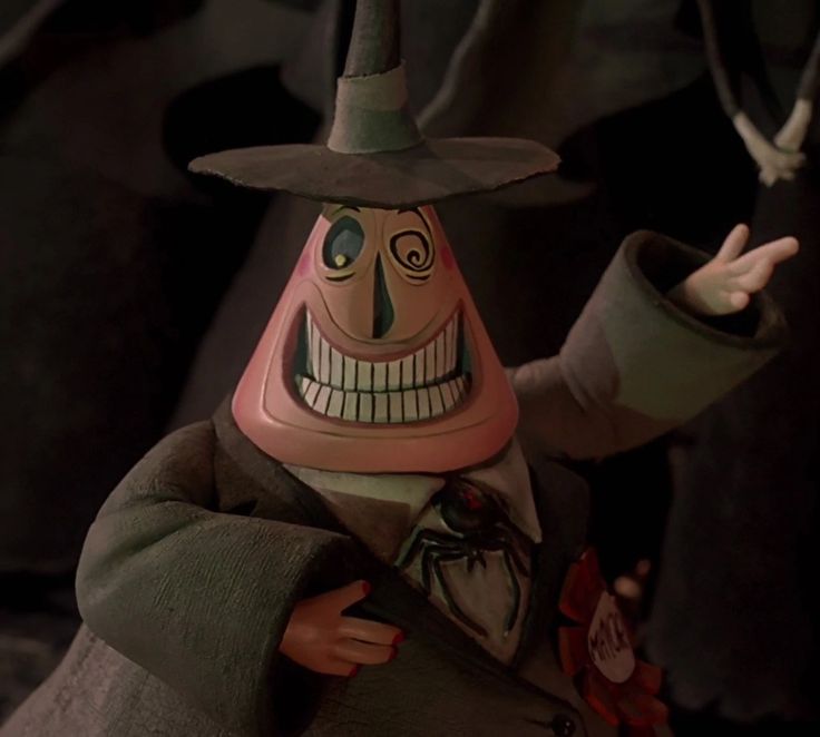 an animated character wearing a hat and holding his hand out in front of the camera