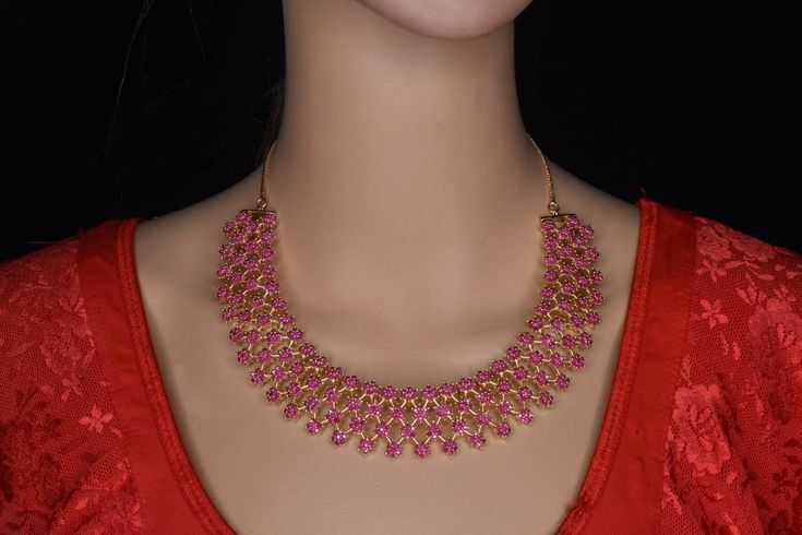 Beautiful ruby necklace with pressing style earrings. South traditional necklace . Suitable for pattu sarees Luxury Heavy Ruby Temple Necklace, Pink Temple Necklace For Festivals, Pink Temple Jewelry Necklace For Diwali, Pink Temple Jewelry Necklace For Festivals, Pink Temple Jewelry For Puja, Pink Temple Jewelry Necklace For Festive Occasions, Pink Temple Necklace For Festive Occasions, Festive Pink Temple Necklace, Pink Temple Necklace For Diwali