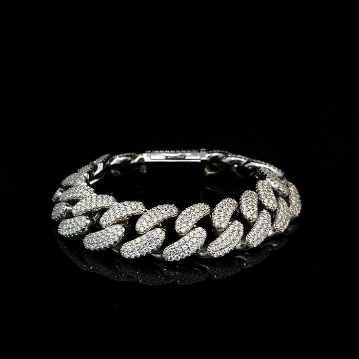 Icy Cuban Link Bracelet encrusted with Moissanite Width : 20m Dial in the full look - Get the matching chain here Options in natural diamonds, lab diamonds and colored stones available by custom order. Send us an email. White Jubilee Bracelet Jewelry With Cubic Zirconia, White Jubilee Bracelet With Cubic Zirconia, White Cubic Zirconia Jubilee Bracelet, Sterling Silver Bracelet With Pave Diamond Setting, Silver Diamond Bracelet With Pave Setting, Luxury White Gold Cuban Link Bracelet With Diamond Cut, Luxury Diamond Cut White Gold Cuban Link Bracelet, Dazzling Diamond Tennis Bracelet With Pave Setting, Diamond Cut Cubic Zirconia Crystal Bracelet